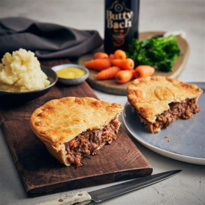  Steak and Ale Pie: Thưởng Thức Sự Hoà Quyện Đáng kinh ngạc Giữa Thịt Bò Nướng Hầm và Bia Malt醇 Mát Lạnh!